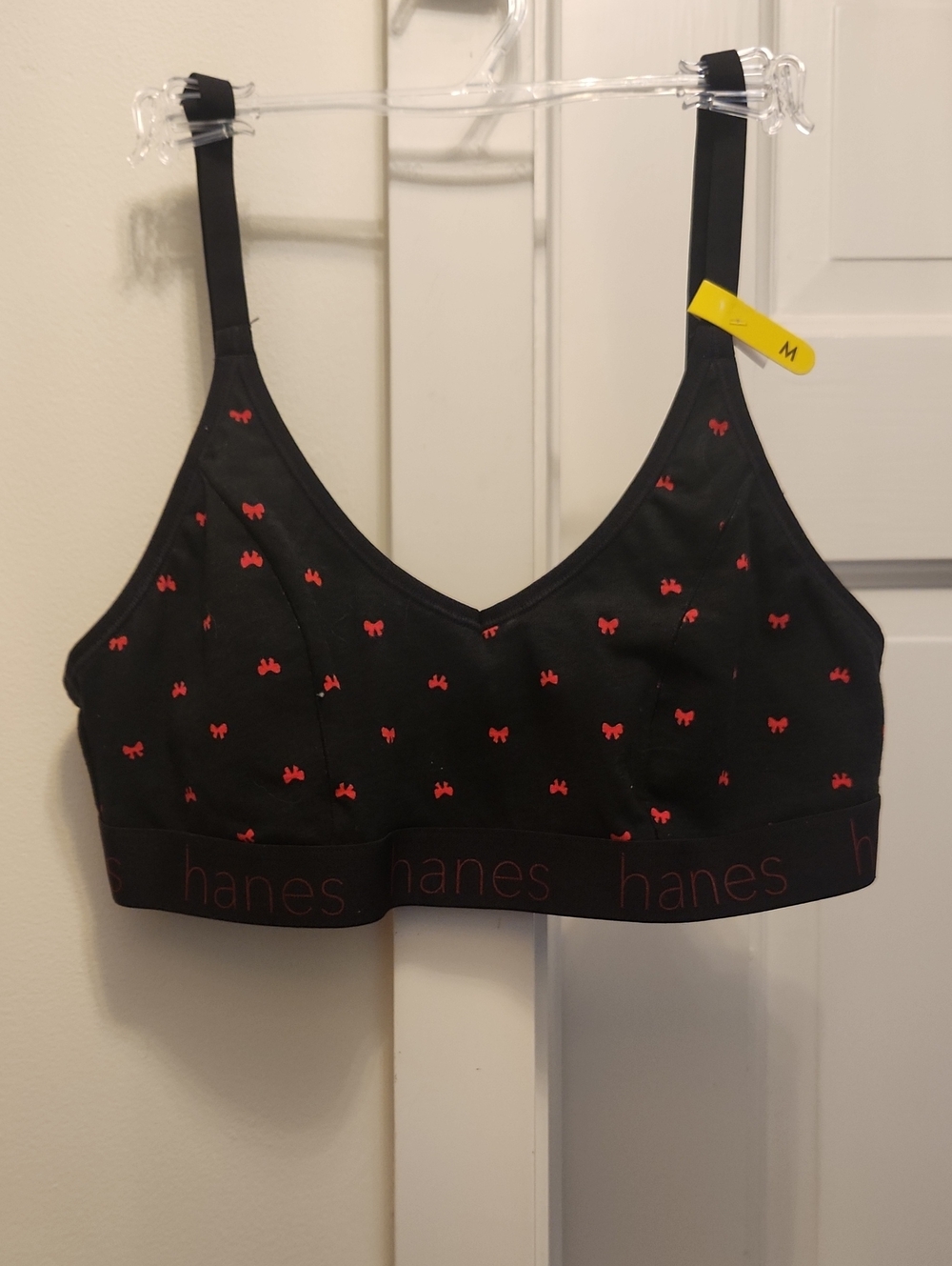 NEW HANES BLACK W/ SMALL RED BOW PATTERN BRALETTE. 95% COTTON 5% SPANDEX. MEDIUM
